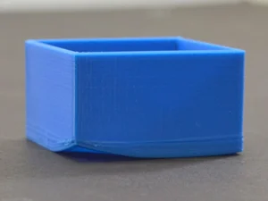 Shrinkage and Warping in Injection Molding